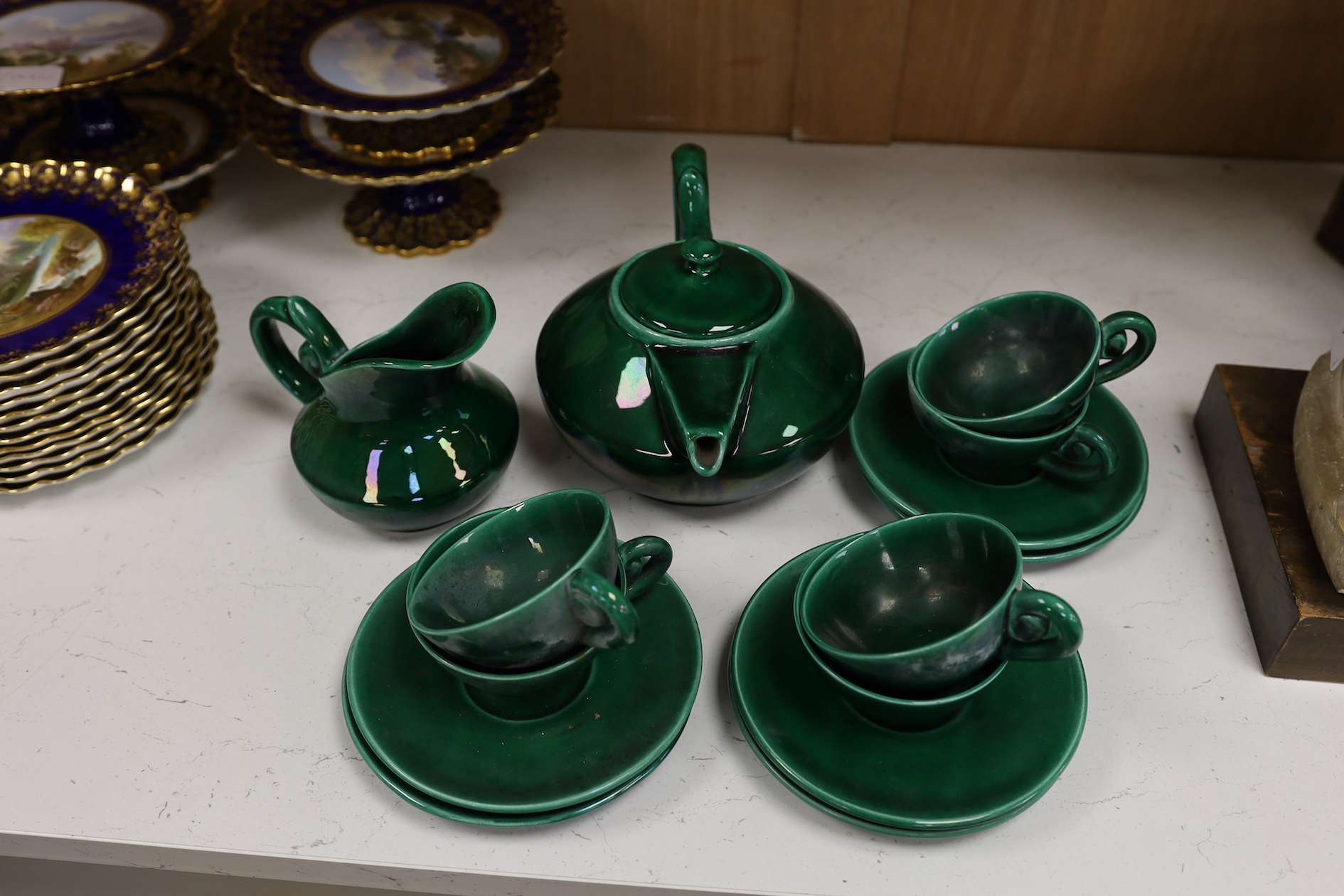 A Vallauris French bright green tea service, with six cups saucers milk jug and tea pot, jug 12.5cm high. Condition - fair to good